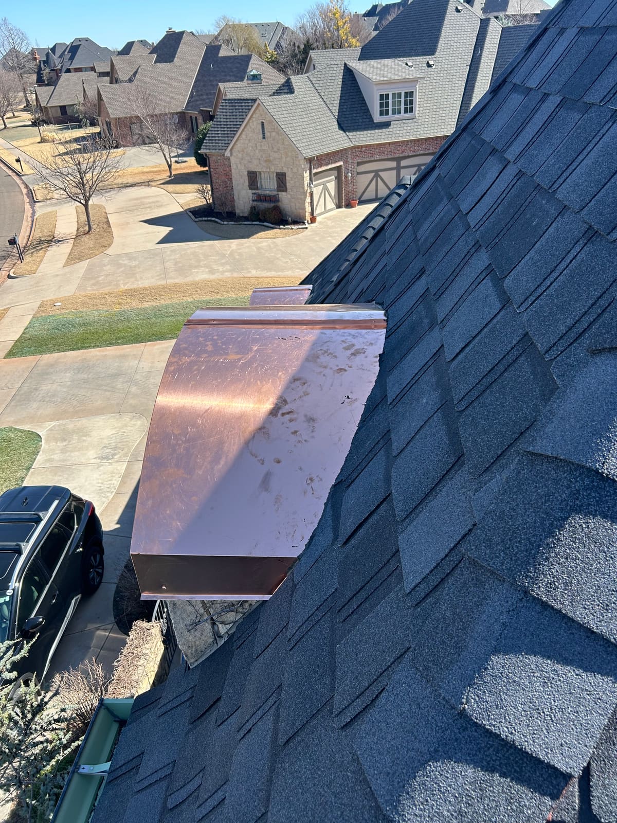 Custom copper dormer cap installation