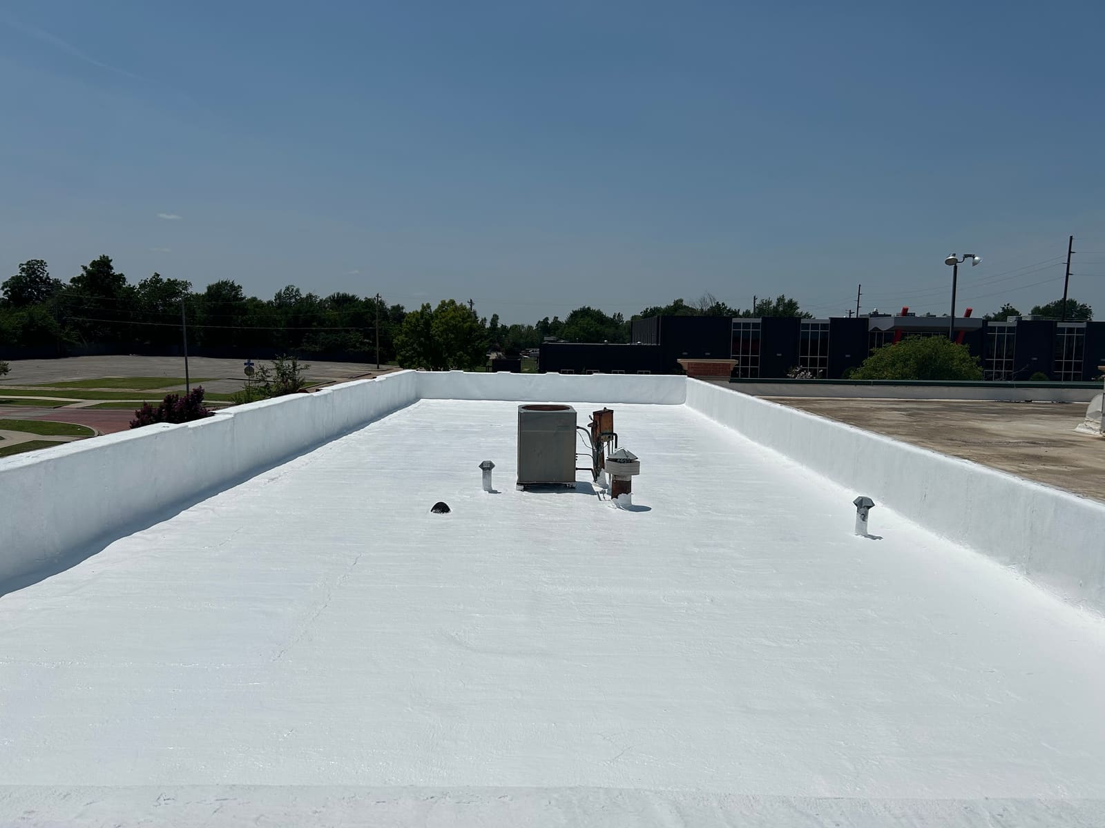 White silicone roof coating system — Gaco 4100 topcoat