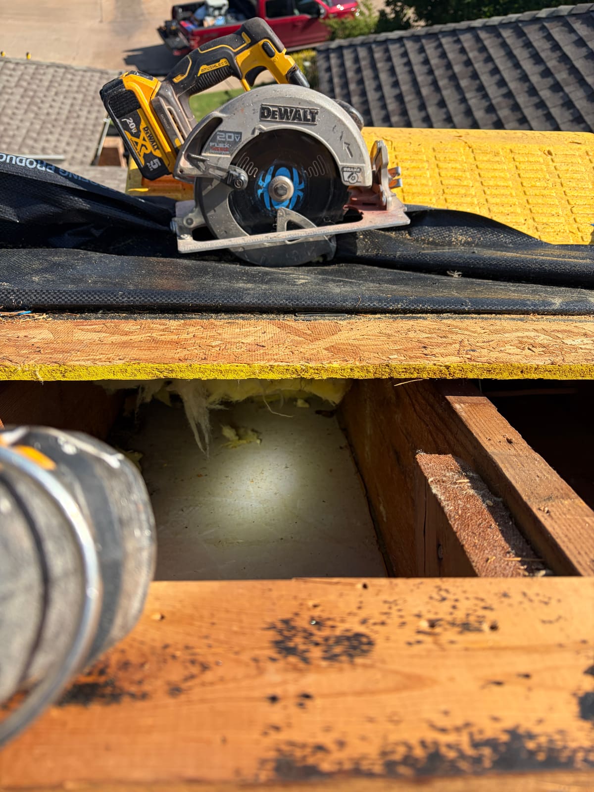 Roof opened with a saw to trace the water path through the decking
