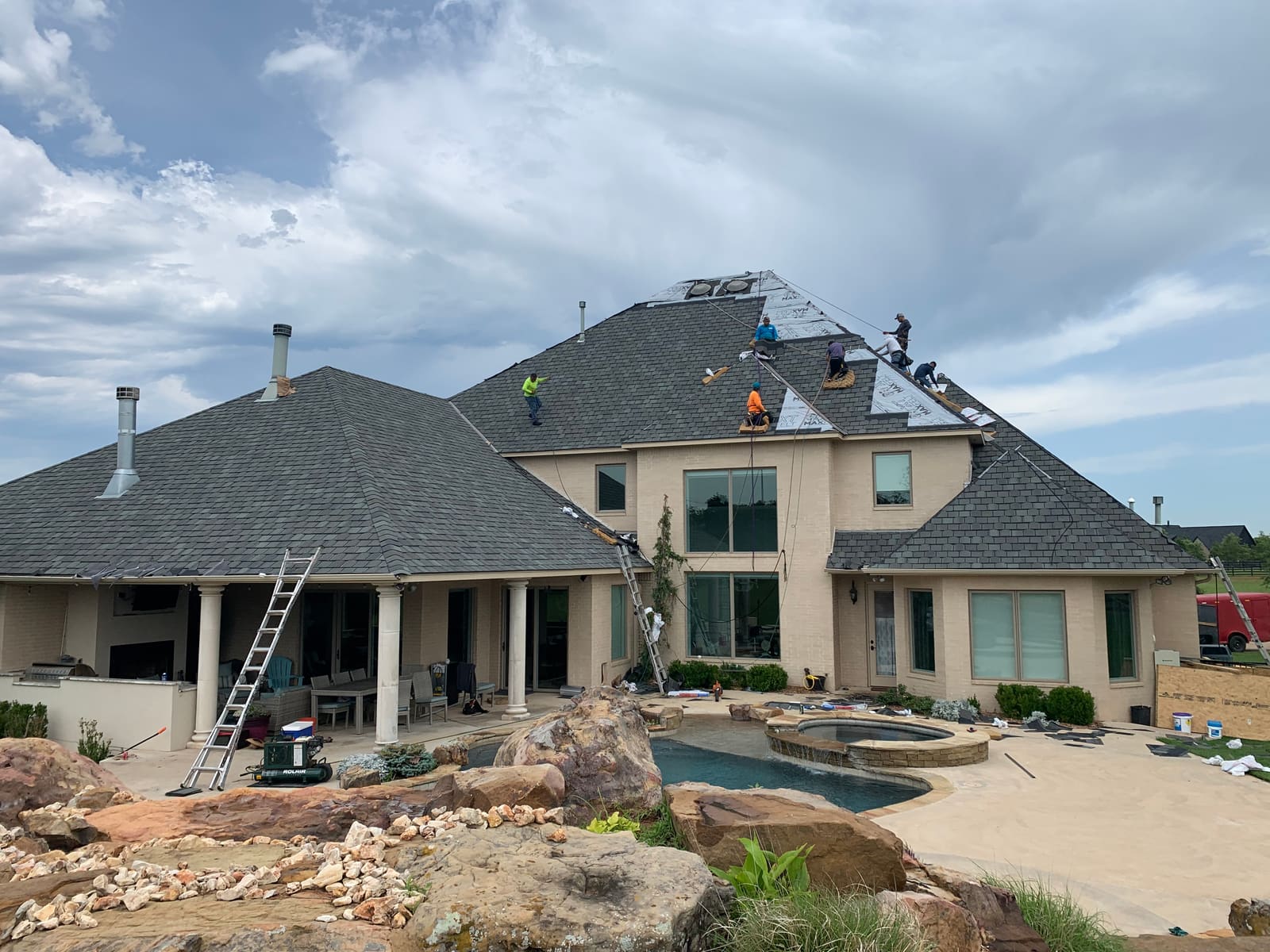 Stripped to the deck and drying-in a big hip roof after the storm